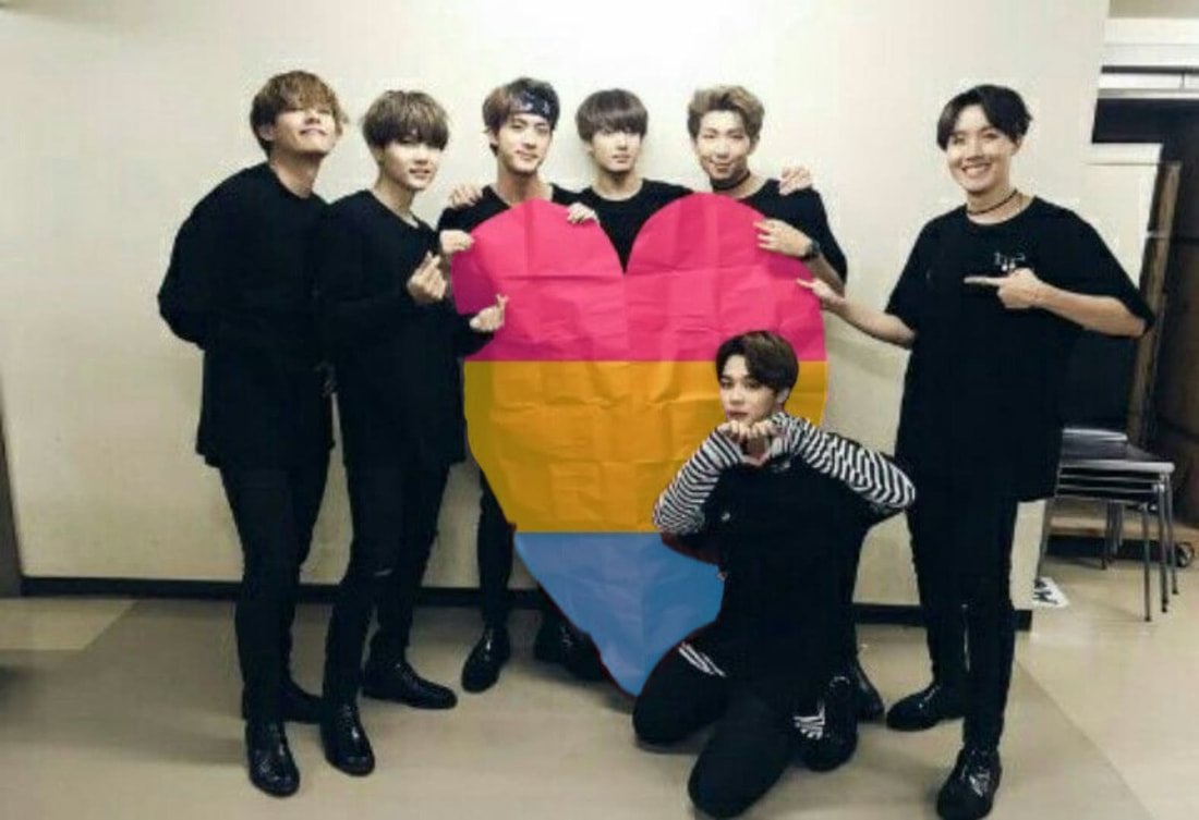 bts holding a heart shaped pan flag